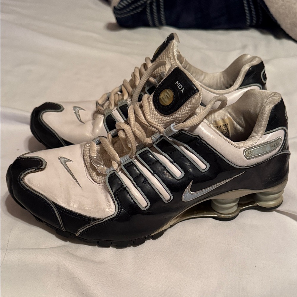 Nike Women’s Black & White Shox Resistant Running Sneakers